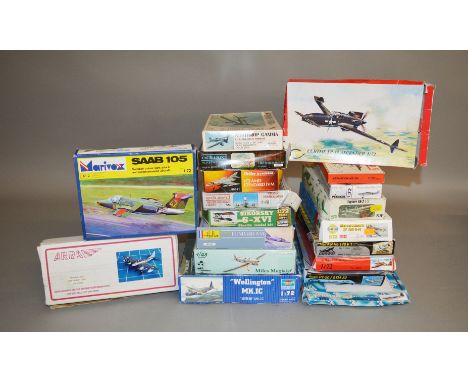 18 boxed plastic model Aircraft kits, predominantly in 1:72 and 1:48 scales by various manufacturers including Heller, Trumpe