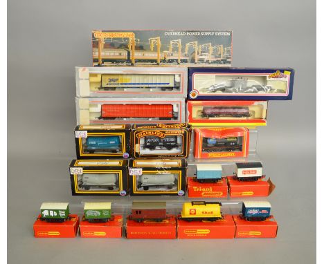 OO Gauge. 16 boxed Wagons by Dapol, Hornby, Lima and others including a Bachmann&nbsp; 33-878 45 ton Bogie Well Wagon. A boxe