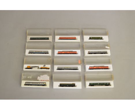 Z Gauge. 11 boxed Marklin Mini-Club Coaches in various different liveries - DB, Southern Pacific etc. &nbsp; together with a 