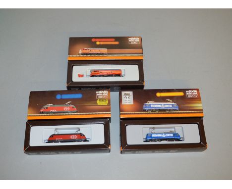 Z Gauge. 3 boxed Marklin Mini-Club Locomotives including 8809 EMD F7 Southern Pacific Daylight Diesel, 88441 SBB Electric and