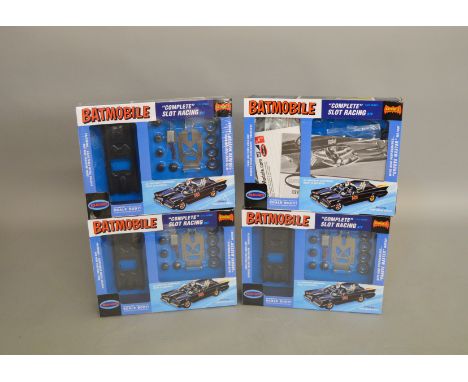 4 boxed Polar Lights 'Batmobile' 1/32 scale Slot Racing kits, three of the boxes retaining their shrink-wrap. (4)