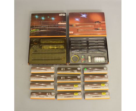 Z Gauge. 12 boxed Marklin Mini-Club Track sections including 4 x 8529, 8560,&nbsp; 2 x 8562, 3 x 8565 and 2 x 8566&nbsp; toge