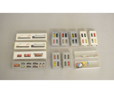 Z Gauge. 11 boxed Marklin Mini-Club Vehicle Accessory sets including trucks, cars and vans together with two boxes containing
