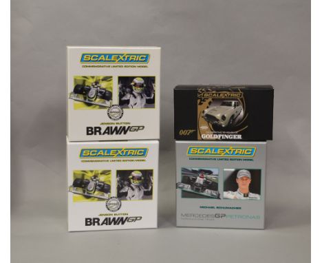 4 boxed Scalextric slot cars including 2 x C3047A Jenson Button Brawn BGP001 and C3148A Michael Schumacher Mercedes GP Petron