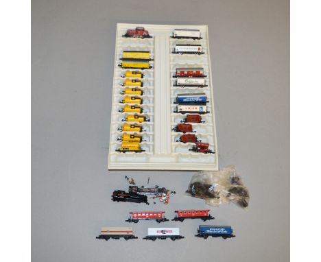 Z Gauge. 18 unboxed Marklin Mini-Club Coaches and Wagons in various different liveries  together with 3&nbsp; unboxed Locomot