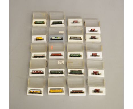 Z Gauge. 20 boxed Marklin Mini-Club Coaches and Wagons of various different types, all appear G/VG boxed. (20)