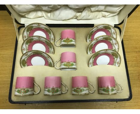 A cased Royal Worcester coffee cup and saucer set