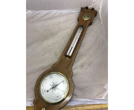 A mahogany inlaid barometer and thermometer