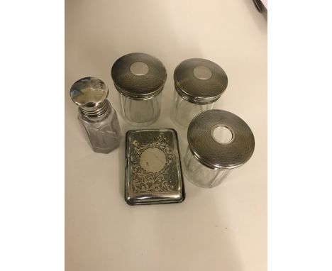 A quantity of hallmarked silver to inc a cigarette case, three silver topped hair tidies and a hallmarked silver screw-topped