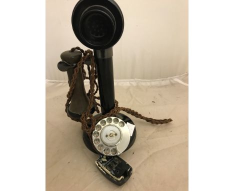 A stick telephone