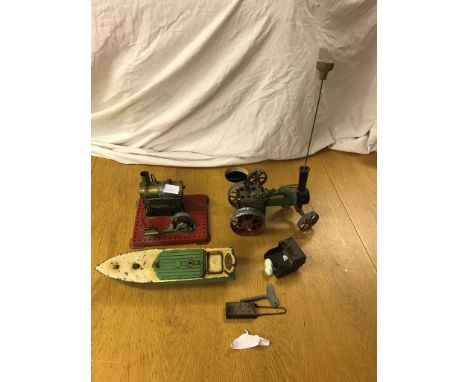 A Mamod steam engine; together with a Hornby speedboat and one other
