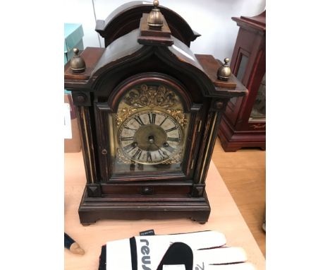 A brass bound bracket clock