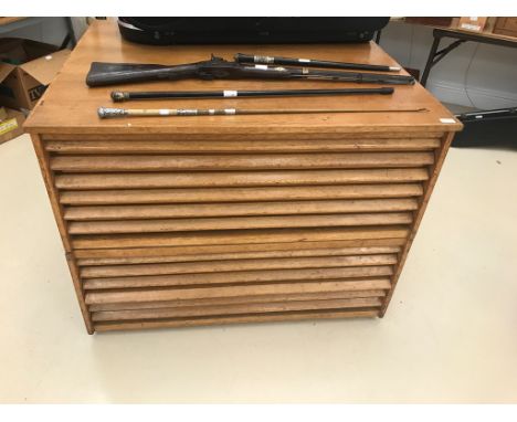 A 1960's light coloured wood plan chest