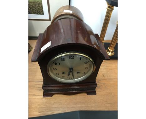 A mahogany cased mantle clock