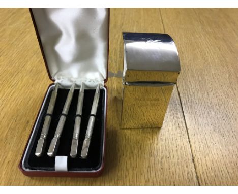 A hallmarked silver playing card set and bridge pence set