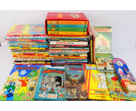A collection of vintage children's books and annuals including Dr Who Annual 1981; 1982 Rupert Annual; The Topper Book 1985; 