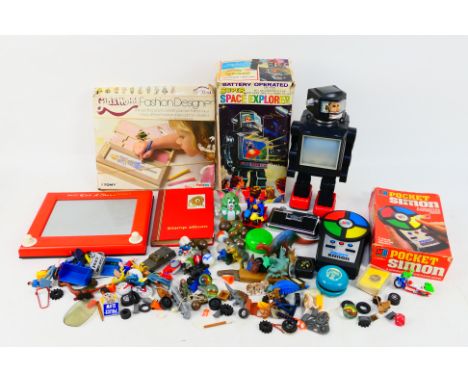 Etch A Sketch - Fashion Designer - Pocket Simon - Space Explorer. A melange of boxed and loose toys appearing in Playworn con