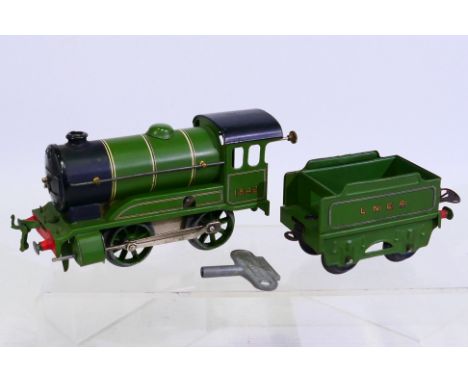 Hornby - An unboxed Hornby O gauge Type 501 clockwork 0-4-0 steam locomotive and tender Op.No. 1842 in LNER green livery. The