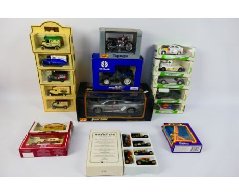 Britains - Maisto - Corgi - Lledo - A collection of boxed diecast model vehicles in several scales, including Britains # 9488