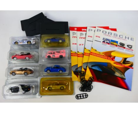 DeAgostini - 8 x boxed/carded die-cast 1:43 scale 'Porsche' models - Lot includes a #001 Porsche in dark blue livery. A #002 