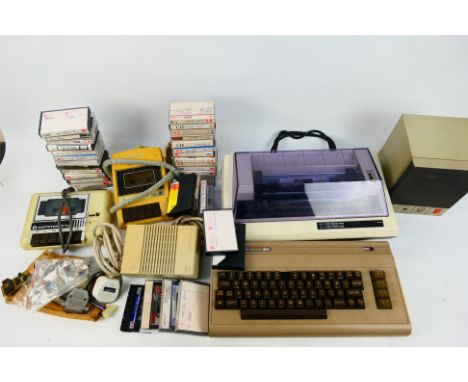 Commodore - C64 - Datasette - Speaker. An unboxed Original C64 with two Datasettes included and a speaker with cables, games 