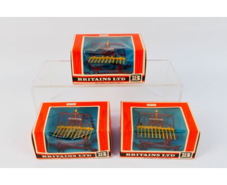 Britains - Three boxed Britains #9543 Buck Rakes. The models appear to be in Mint condition, in generally Excellent window bo