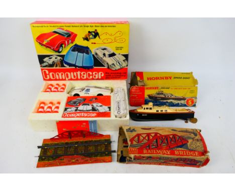 Mettoy - Hornby - Three boxed vintage toys. Lot consists of a Mettoy Computacar; Mettoy Railway Bridge; together with a Hornb