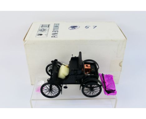 Franklin Mint - Precision Models. A boxed "1899 Packard model A1" with spare rear seating, appearing in excellent condition (