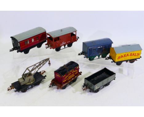 Hornby - A rake of seven unboxed Hornby O gauge freight rolling stock. Lot includes Hornby Saxa Salt Van; Cattle Truck in blu