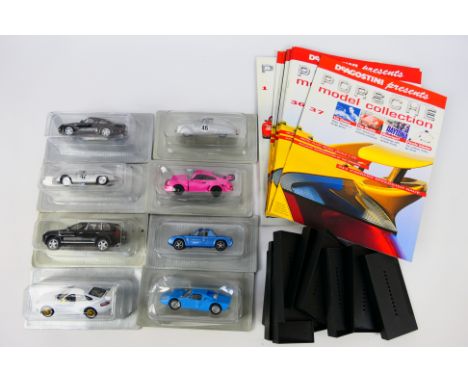 DeAgostini - 8 x boxed/carded die-cast 1:43 scale 'Porsche' models - Lot includes a #044 Porsche model in light blue livery. 