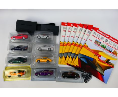 DeAgostini - 9 x boxed/carded die-cast 1:43 scale 'Porsche' models - Lot includes a #006 Porsche model in red livery. A #009 