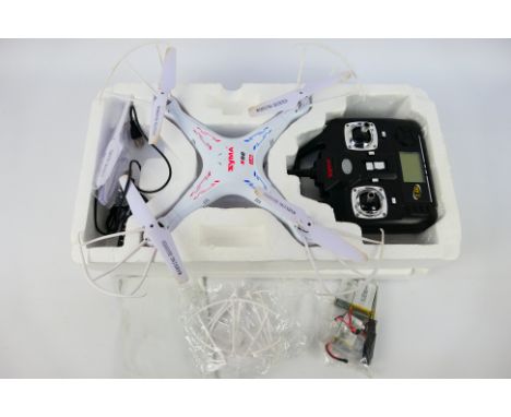 Syma  - A partially boxed Syma X5C RC quadcopter / drone. The model shows signs of use appearing to be in Fair Plus - Good co