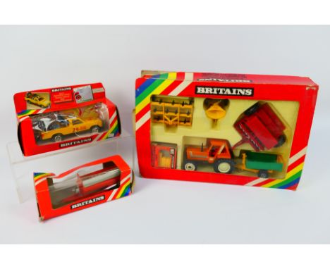 Britains - A boxed Fiat 880 DT tractor and farm implements set # 9591, a boxed Chevy pickup truck # 9573 and a boxed Howard r