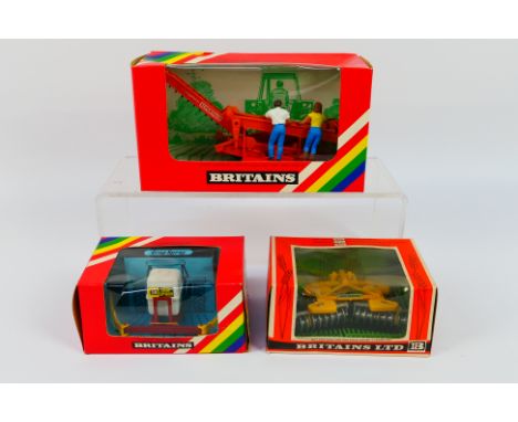 Britains - Three boxed Britains farm implements. Lot consists of #9553 Disc Harrow; #9548 Crop Spray; plus #9535 Potato Harve