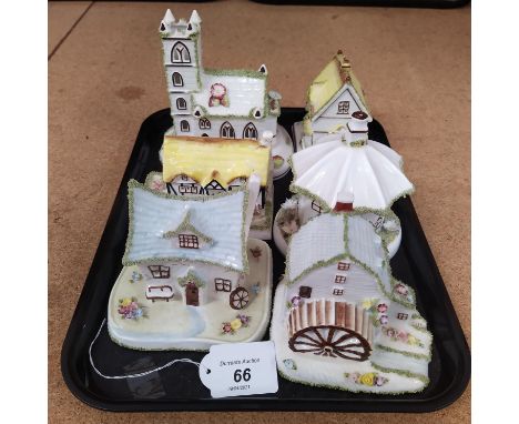 Six Coalport ceramic cottages