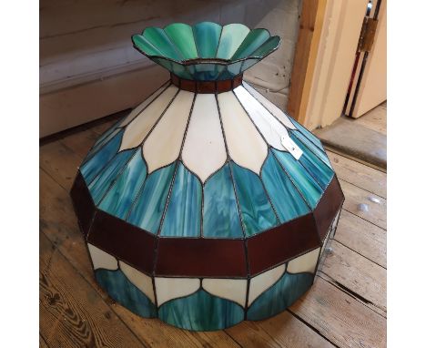 A very large Liberty style stained glass lamp shade, 17" high and 22" dia