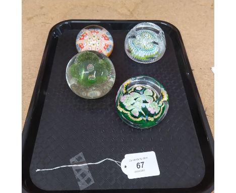 Four glass paperweights, one marked for Caithness, two with hidden dates in the canes, 1976/79