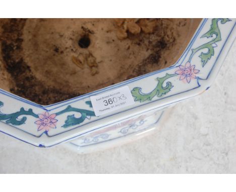 Three 20th Century Chinese ceramic planter pots, each of octagonal form to include one blue and white example and two pink an