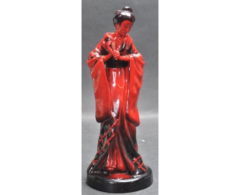 A late 20th century ceramic&nbsp;Royal Doulton Flambe The Geisha : HN3229 figurine raised on a circular base. Makers mark to 