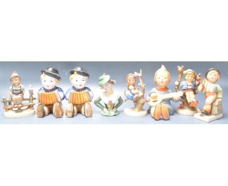 A collection of eight vintage retro 20th century west German W. Goebel ceramic porcelain figurines to include children’s with