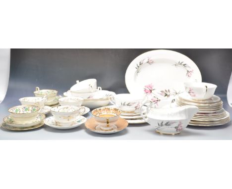 A collection of vintage 20th century ceramic part dinner services having polychrome floral decoration through. Collection inc