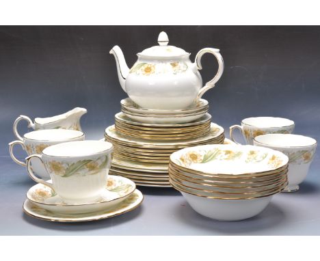 An early 20th century Duchess, Staffordshire, England porcelain tea service in a chintz foliate pattern to include the teapot