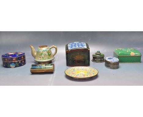 A collection of Chinese oriental enamel, ceramic and metal cabinet wares to include enamel teapot, enamel disk, enamel powder