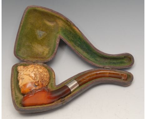 A 19th century German novelty meerschaum pipe, carved as the head of a lady wearing a turban, silver coloured metal ferule, 1