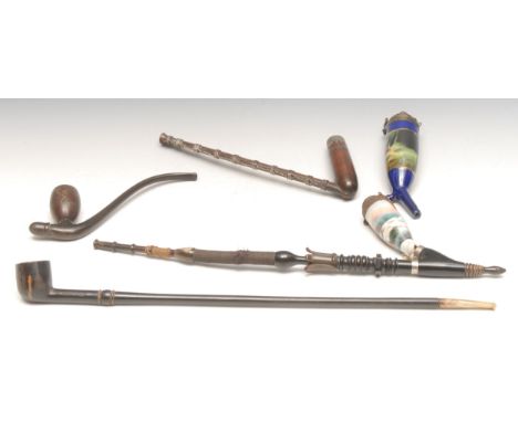 A Xhosa tribal pipe, of typical form, metal inlaid bowl, copper wire bound stem, 23.5cm long, South Africa, c.1900; others, s