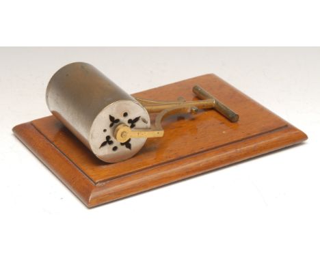 A Victorian novelty desk clip, as a garden roller, rectangular oak base, registration lozenge, 17.5cm wide, c.1890 