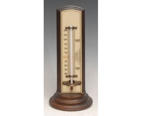 An early 20th century rosewood table top thermometer, ivorine scale inscribed Blood Heat, Indoor Healthy Temperature, and Fre