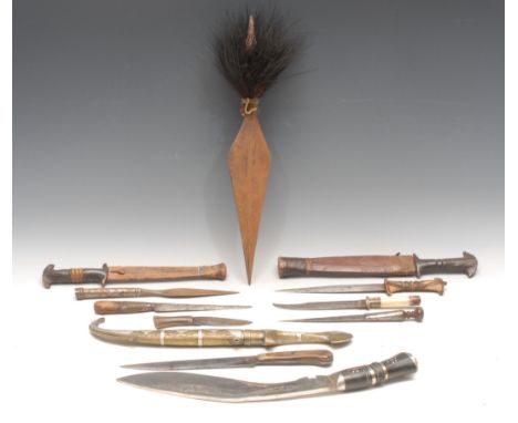 A 19th century Middle Eastern knife or dagger, 19cm single-edged blade, two-piece horn grip, 30cm long overall; a North Afric