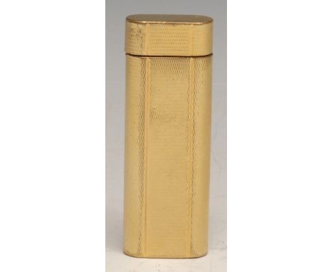 Cartier - a gilt metal cigarette lighter, engine turned, serial no. N51363, 7cm long 