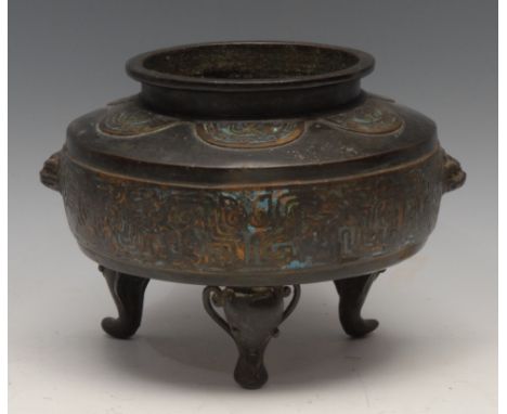 A Chinese bronze and champleve enamel censer, in the Archaic taste, 16.5cm high 